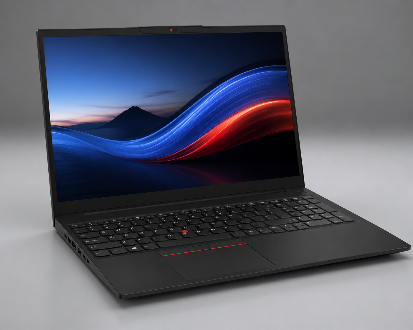 Lenovo ThinkPad E16 laptop on office desk with modern workspace setup